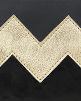 Vegane Zick-Zack-Clutch 'Zilia' - Schwarz/Gold